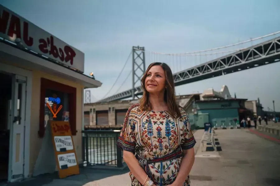 Tiffany Pisoni, owner of Red's Java House, stands outside her restaurant